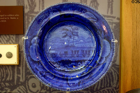Ceramic plate with painting of train excavated from hotel used in 1830s by legislators & local planters in museum of old State Capitol. Tallahassee, FL.