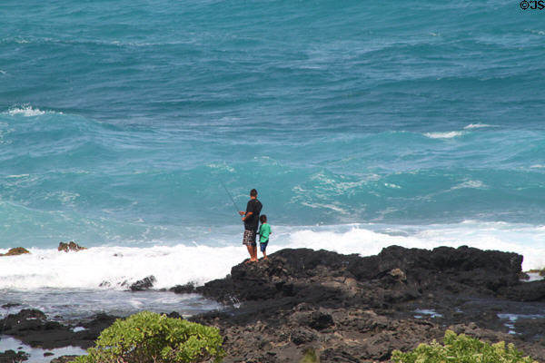 People fishing near at Sea Life Park. HI.