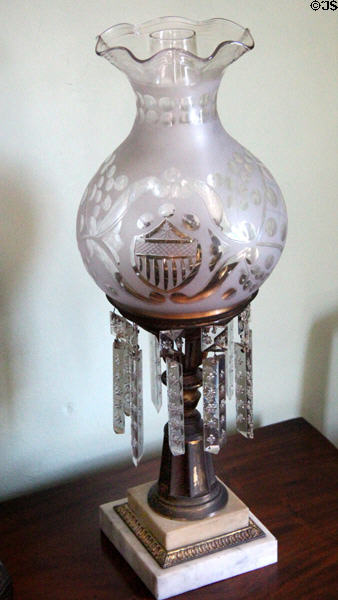Kerosene luster lamp with cut glass shade with American shield at Jeremiah Lee Mansion. Marblehead, MA.