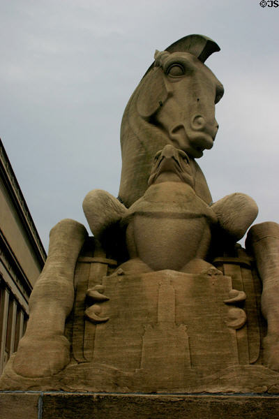 Horse & eagle holding shield of Baltimore outside World War Memorial. Baltimore, MD.