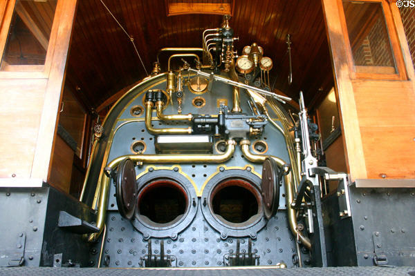 Cab of Schenectady Locomotive Works steam engine (1902) used for express Detroit-Chicago passenger trains in roundhouse of Greenfield Village. Dearborn, MI.