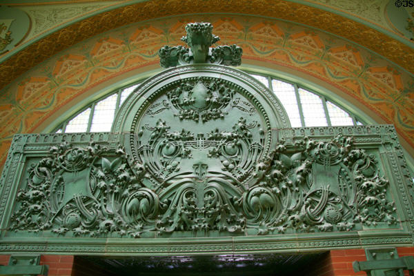 Irish-style scrollwork over entrance of National Farmer's Bank. Owatonna, MN.