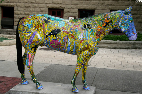 Multicolored horse with native-like themes sidewalk art. Billings, MT.
