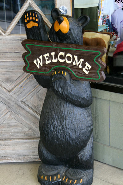 Carved bear welcome sign. West Yellowstone, MT.