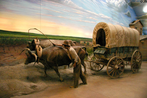 Diorama of settlers with covered wagon at Kearney Arch. Kearney, NE.