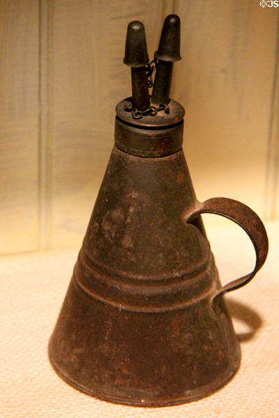 Tin whale oil lamp in Garrison house at Woodman Museum. Dover, NH.