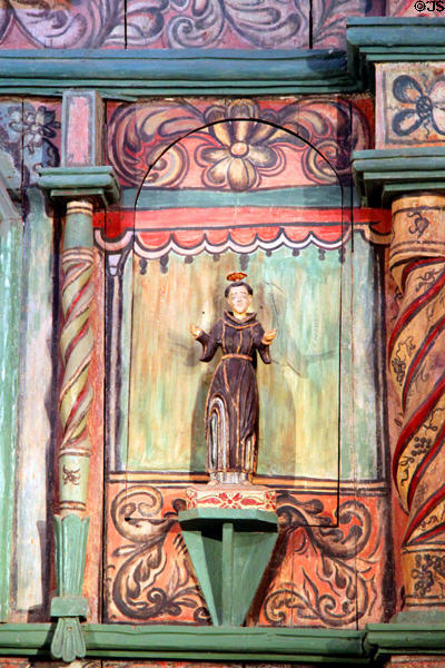 Spanish-style saint carving on reredos of San Miguel Mission. Santa Fe, NM.