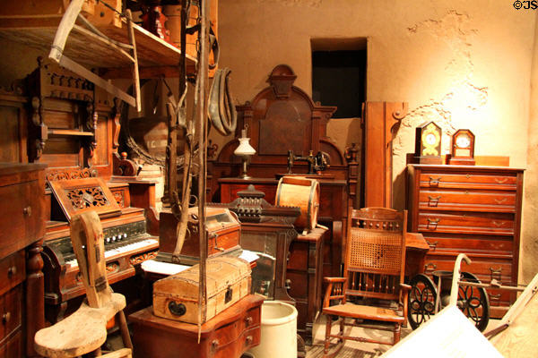 Collection of early household objects displayed as trade warehouse at Albuquerque Museum. Albuquerque, NM.