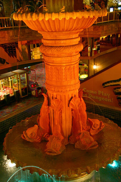 Dolphin fountain decorates Interior of Excalibur Hotel & Casino. Las Vegas, NV.