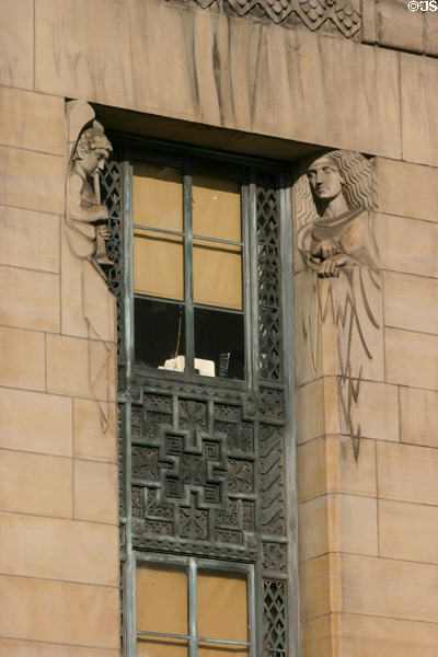 Buffalo City Hall figures which flank windows. Buffalo, NY.