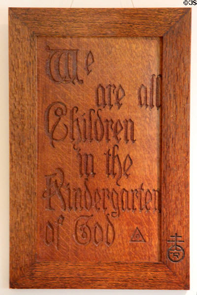 "We are all Children in the Kindergarten of God" wood carved slogan by Roycroft at Elbert Hubbard Roycroft Museum. East Aurora, NY.