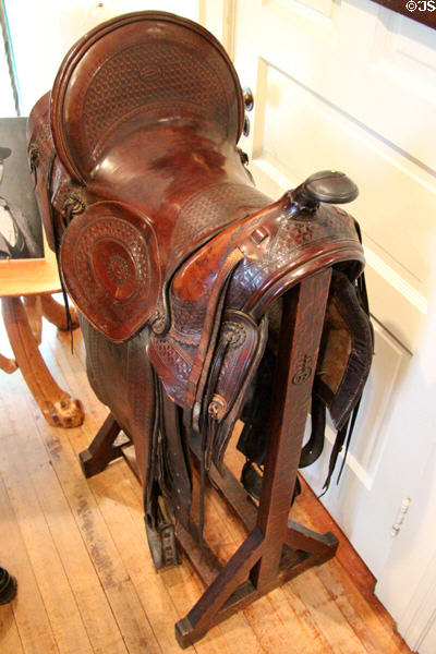Saddle on Roycroft saddle rack at Elbert Hubbard Roycroft Museum. East Aurora, NY.
