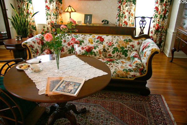 Floral pattern sofa & tea table in Mrs. Eastman's bedroom at Eastman House. Rochester, NY.