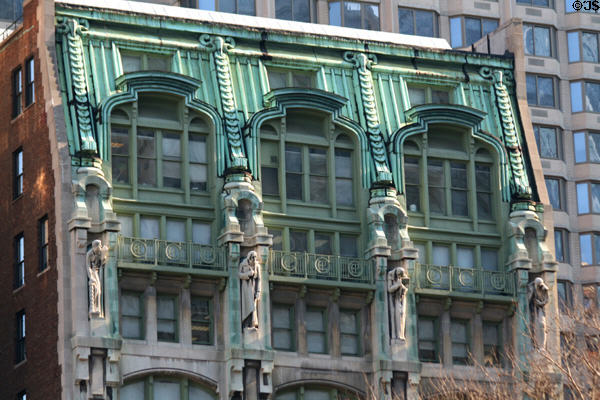 Old New York Evening Post Building four statues: 2 by Gutzon Borglum + 2 by Estelle Rumbold Kohn (wife of architect). New York, NY.
