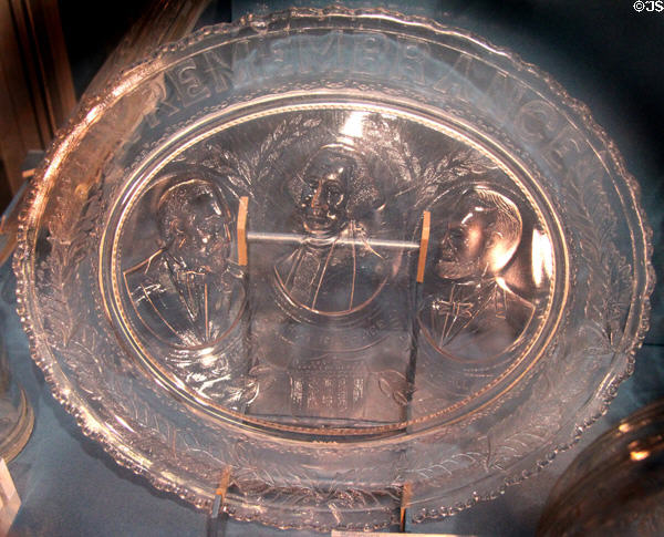 Pressed glass American Centennial plate in Remembrance of Grant, Washington & Lincoln at Brooklyn Museum. Brooklyn, NY.