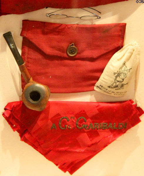Giuseppe Garibaldi's Italian rebellion scarf, pipe & glasses at Garibaldi-Meucci Museum. Staten Island, NY.