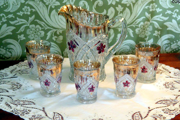 Pressed glass pitcher with tumblers in parlor at Sherwood-Davidson House. Newark, OH.