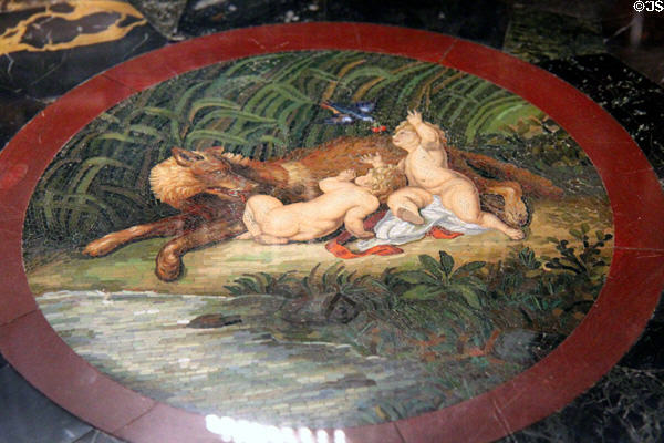 Mosaic insert of Romulus & Remus with wolf on hall table at Kingscote. Newport, RI.
