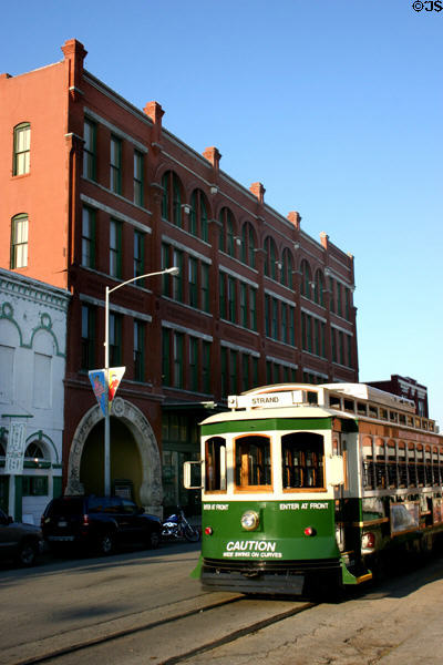 Galveston Island Trolley passes Grand Opera House. Galveston, TX.