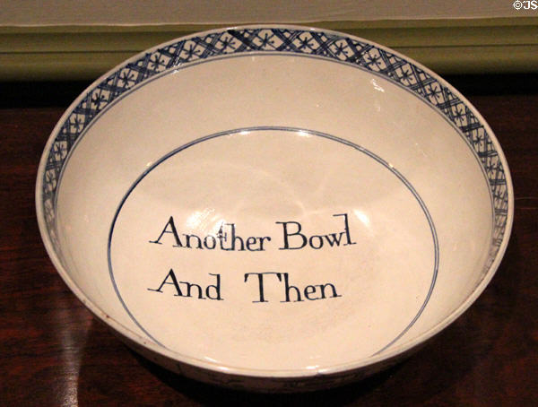 Antique ceramic punchbowl inscribed "Another Bowl And Then" at Bayou Bend. Houston, TX.