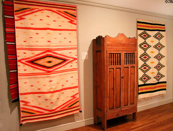 Native woven blankets & cabinet from New Mexico at McNay Art Museum. San Antonio, TX.