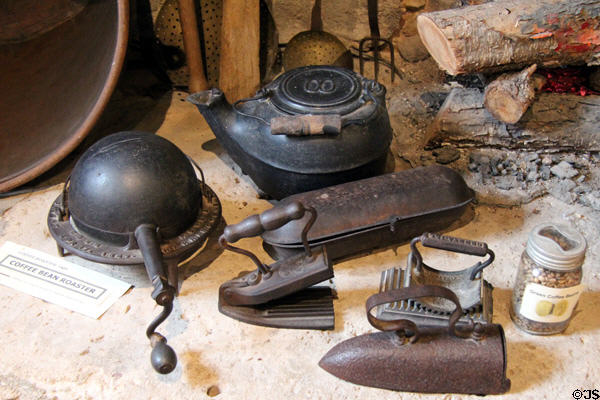 Metal coffee bean roaster & ironing devices in Kammlah kitchen at Pioneer Museum. Fredericksburg, TX.