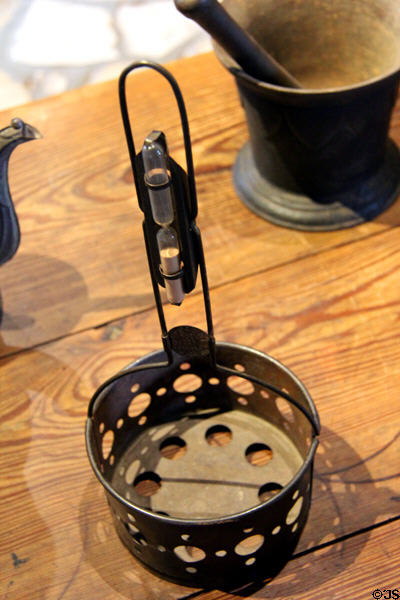 Egg boiling rack with built-in sand hour-glass timer in Kammlah kitchen at Pioneer Museum. Fredericksburg, TX.