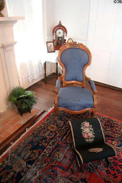 Armchair & embroidered footstool at Fort House. Waco, TX.