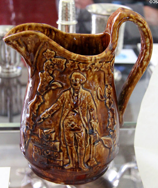Rockingham-type pitcher (19thC) showing George Washington in Masonic regalia at Bennington Museum. Bennington, VT.
