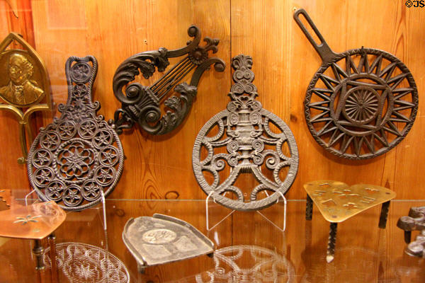 Collection of metal trivets at Shelburne Museum. Shelburne, VT.