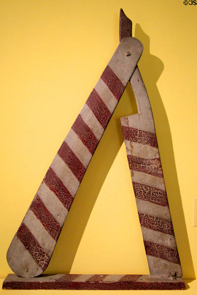 Barber's shop sign (19thC) from Burlington, VT at Shelburne Museum. Shelburne, VT.