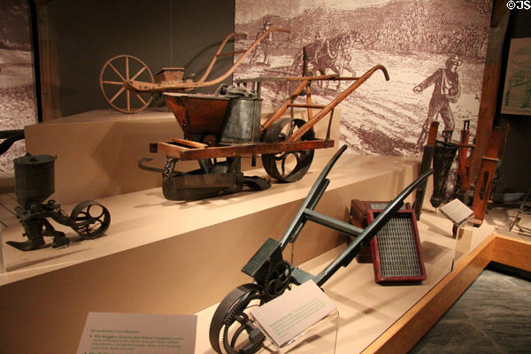 Antique horse-drawn wheeled corn planters at Billings Farm & Museum. Woodstock, VT.