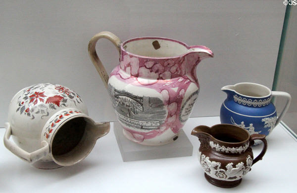 Collection of ceramics produced in Liverpool including pink lusterware jug showing Liver Bridge at Walker Art Gallery. Liverpool, England.