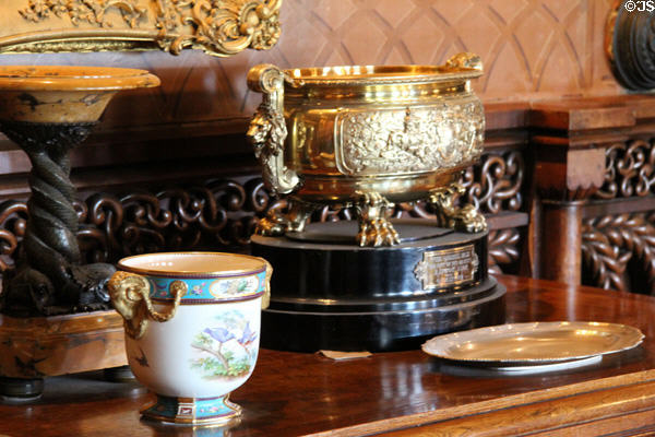 Sideboard with decorative objects in dining room at Penrhyn Castle. Bangor, Wales.