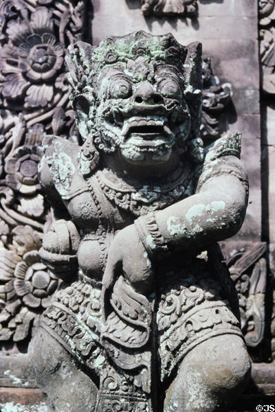 Moss covered carving at Denpasar Museum. Bali, Indonesia.