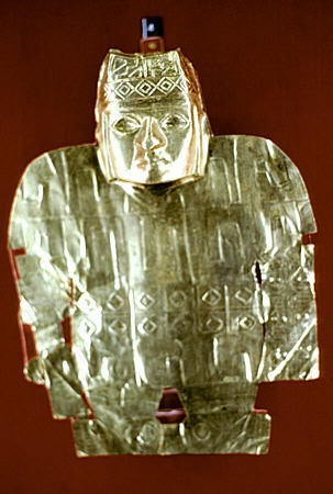 Unidentified pre-Incan human figure ornament in Gold Museum, Lima. Peru.