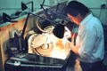 Demonstrating opal polishing in a shop in Adelaide. Adelaide, Australia.