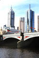 Princess Bridge in front of skyscrapers in Melbourne. Melbourne, Australia.