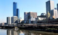 Flinders Street Station & Melbourne skyline from south bank of Yarra River. Melbourne, Australia.