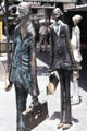 Three Businessmen who brought their own lunch sculpture by Alison Weaver & Paul Quinn on corner of Bourke & Swanston Streets. Melbourne, Australia.