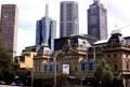 Princess Theatre sits among a backdrop of Melbourne skyscrapers. Melbourne, Australia.