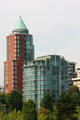 Conical-roofed 1888 Alberni over typical apartment along Bayshore. Vancouver, BC.