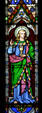 Stained glass Saint John with chalice & serpent in Christ Church Cathedral. Fredericton, NB.