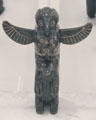 Inuit black stone carving of totem from Quebec at National Gallery of Canada. Ottawa, ON.
