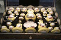 Meissen porcelain tea & chocolate service decorated in yellow with European scenes in white quatrefoils in original case at Gardiner Museum. Toronto, ON.