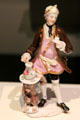 Porcelain figure of footman serving coffee by Vienna State Porcelain Manuf., Austria at Gardiner Museum. Toronto, ON.