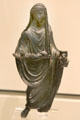 Roman bronze figurine of man wearing toga from Rome at Royal Ontario Museum. Toronto, ON.