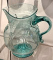 Canadian green Mallorytown blown-glass pitcher with spiral threads from near Brockville, ON at Royal Ontario Museum. Toronto, ON.