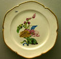 Faience plate with floral painting by Paul Hannong of Strasbourg, France at Ariana Museum. Geneva, Switzerland.