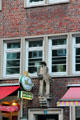 Sculpture of sailor on brick building at Steinstraße & Mohlenhofstraße. Hamburg, Germany.